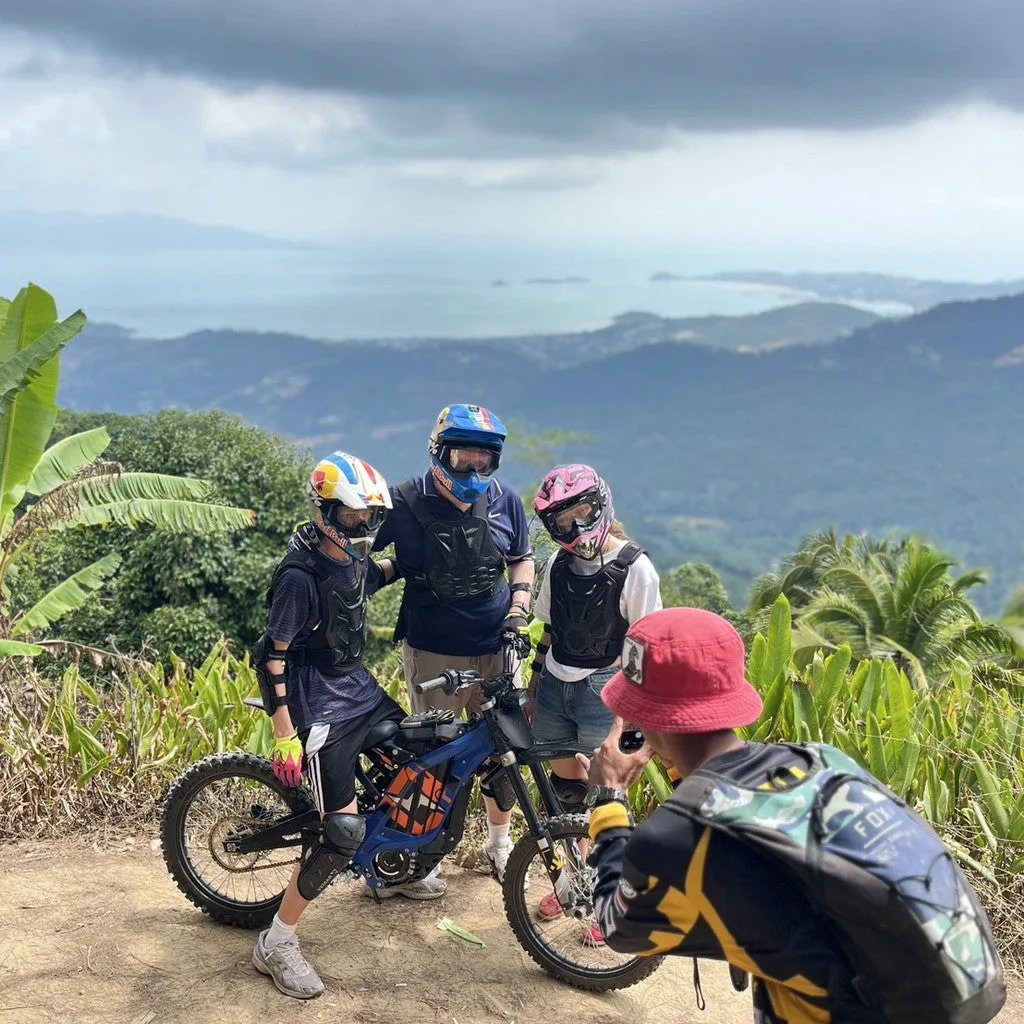 Electric Dirt Bike Tour 2 Hours Koh Samui – riders with electric dirt bikes in a jungle clearing