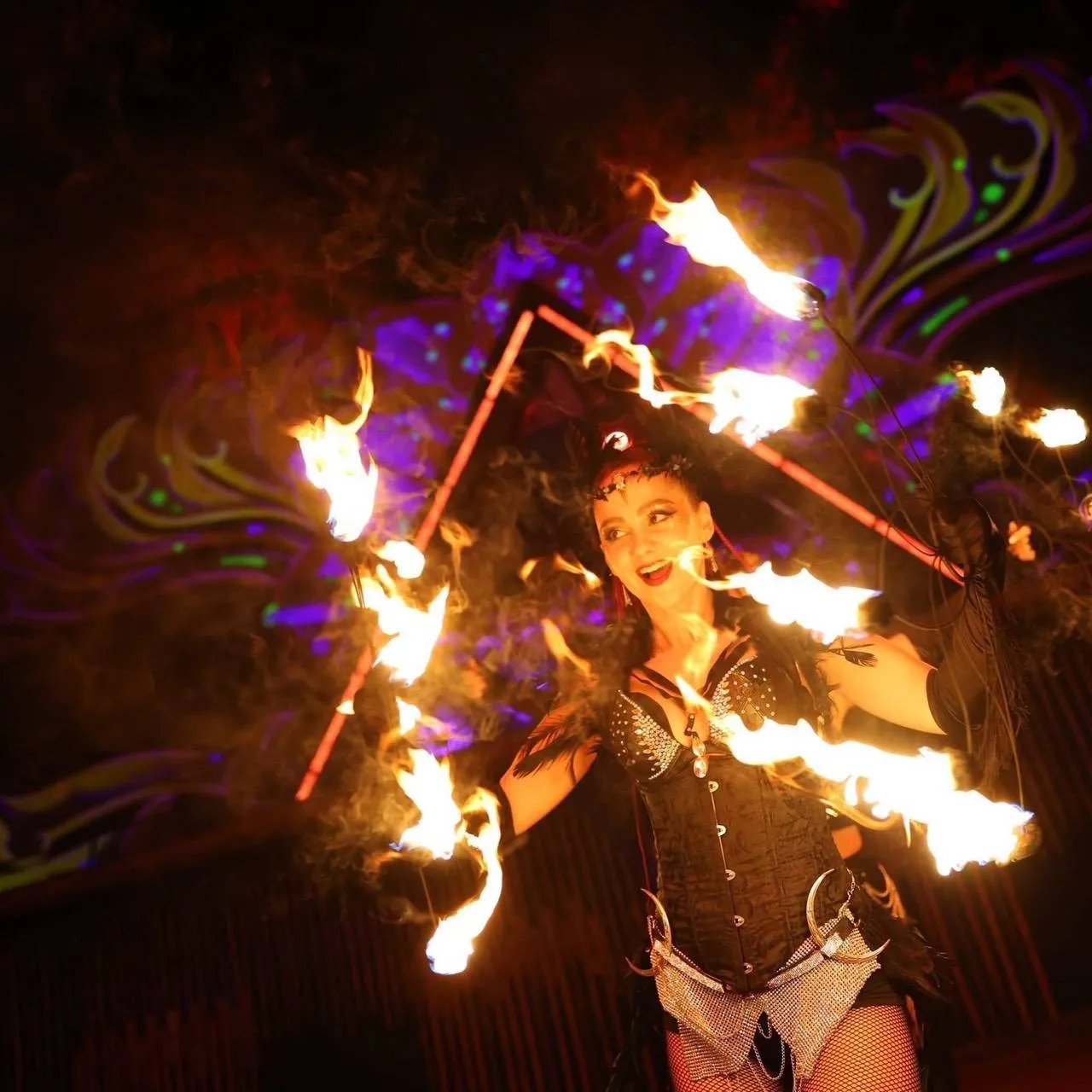 Halfmoon Harmony Beach Party Koh Phangan – fire performer spinning flames at night