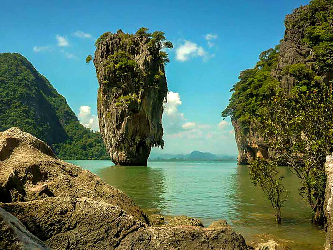 The famous James Bond Island rock between limestone cliffs